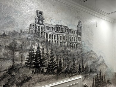 Mural of Old Main as you enter the building
