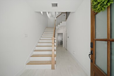 Featuring tile floors and recessed lighting, the e