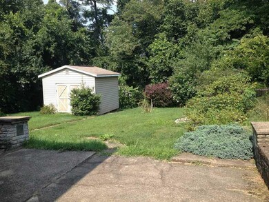 Exterior Back. Back yard & Storage Barn