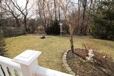 Tree lined backyard backs to open space and Cambri