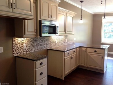 View 2 of the Kraftmaid kitchen. Handscraped wood 