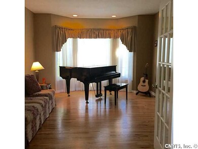 Living Room. Dramatic living room with large bay window.