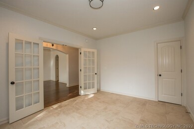 View of office and French Doors and walk in closet