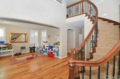 Living room on the left, stairway to upstairs 