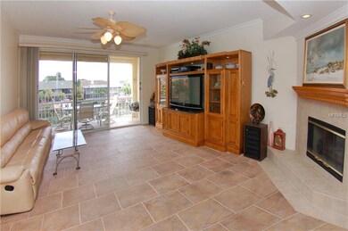 Living room with stacking triple-panel slider. Til