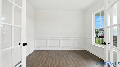 As you enter, you'll be greeted by a formal dining room w/ tray ceiling and a home office with glass French doors located directly off the foyer. 
