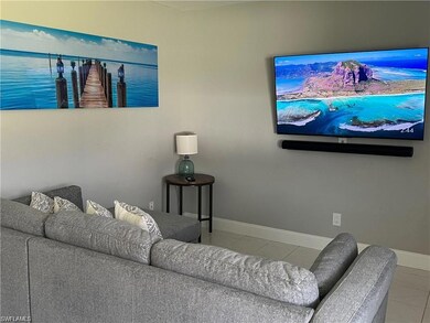 Living room featuring tile patterned floors