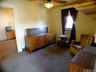 Room immediately to right after entering
