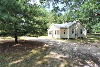 Home is on a beautiful lot & has an extensive grav