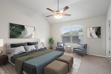 Bedroom with light carpet, vaulted ceiling, and a ceiling fan