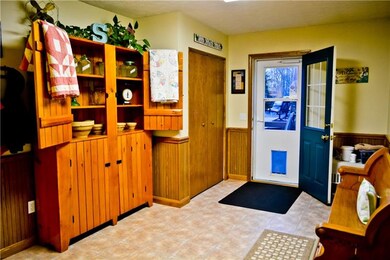 Entry/mudroom with door to deck and pool area