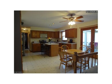 The kitchen is spacious with a dinette area and a 