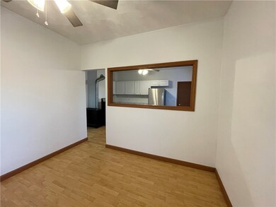LIVING ROOM LOOKING INTO KITCHEN