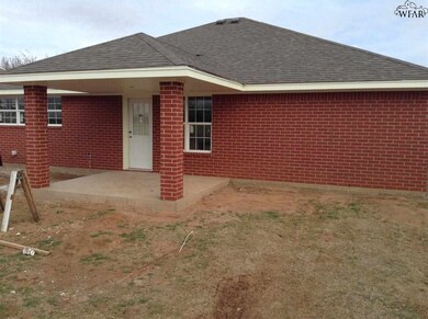 back yard and covered patio