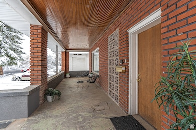 View of patio with a porch
