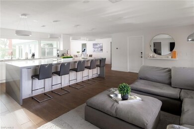Living room with sink and light hardwood / wood-st