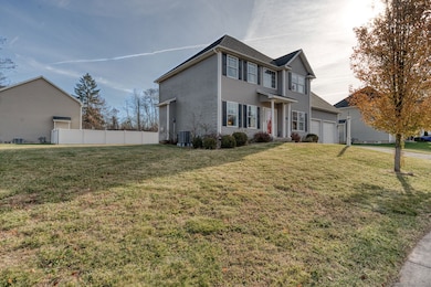 Large side yard offers a wonderful space for outdoor activities.