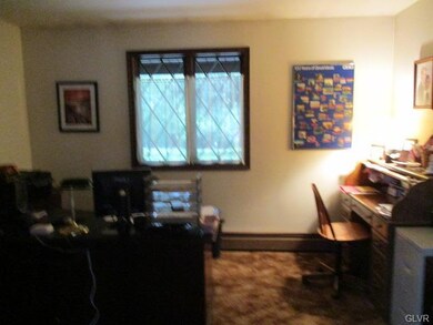 Office, den or could be 4th bedroom on lower level