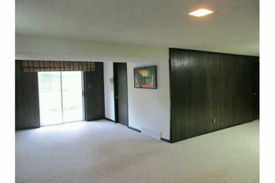 Other. Entry has mirrored closet adjacent to open wood stairway.