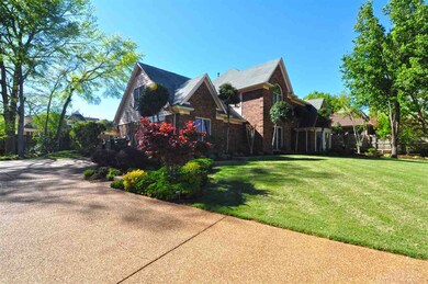 This home is accented with beautiful lush landscap