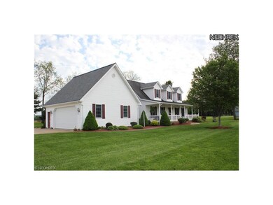 Spacious attached two car garage with man-door acc
