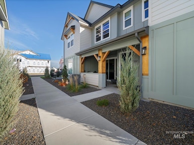View of front of house with board and batten siding