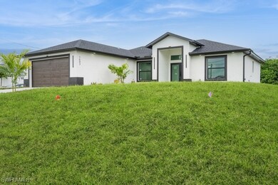 View of front of home featuring an attached garage