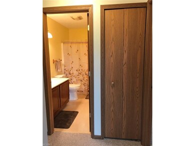 Doorway from living room to hall with full bath, h