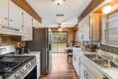 Kitchen has gorgeous stainless steel appliances.