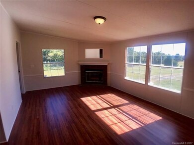 Another view of the family room with fire place.