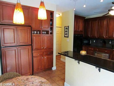 Kitchen - Eat-in Kitchen also Boasts a Custom Cabi