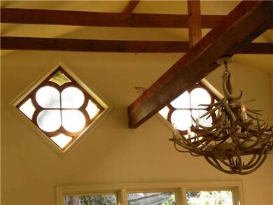 Note the unique windows in the living room.