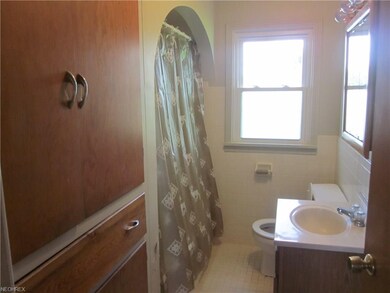 Full bathroom with large linen closet