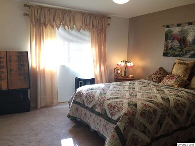 Large master suite with separate sitting area, wal