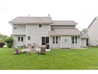 Rear exterior, patio & fire pit.