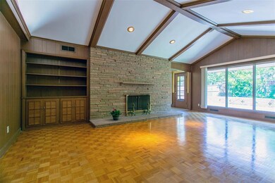 Main living area with amazing stacked stone firepl