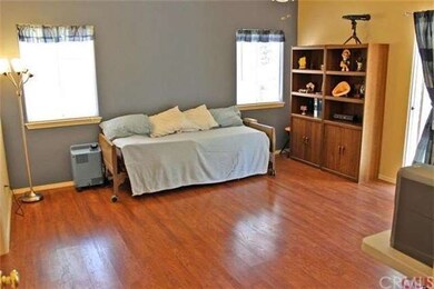 Master bedroom with glass door to the back yard.