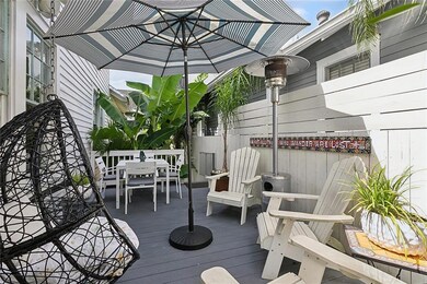 COZY DECK BEHIND THOSE ELEPHANT EARS IS YOUR PLUNG