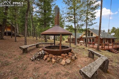 View of yard with a gazebo and a deck