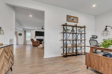 Another view of the front room foyer and office.