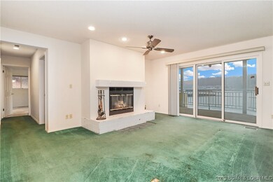 Large living and fireplace.