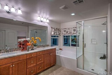 Photo of model home master  bath, photo not intend