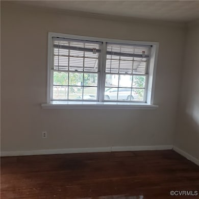 Unfurnished room with wood-type flooring