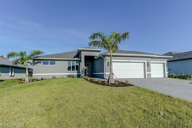 Ranch-style house featuring a 3-car garage