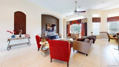 Great room with 12 foot ceilings overlooks lanai a