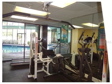 FITNESS CENTER OVERLOOKING HEATED INSIDE POOL AND 