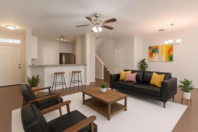 Living area featuring ornamental molding, light w