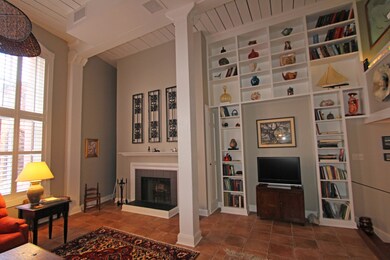 living room bookcase and fireplace