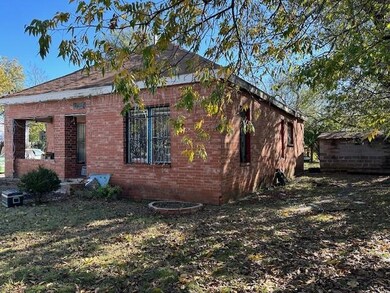 View of home's exterior with a yard