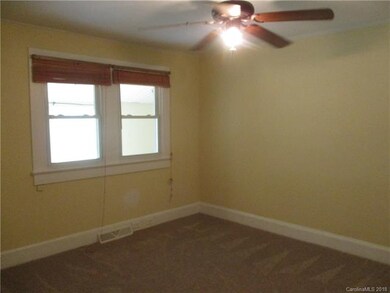 Bedroom 3 with fan and closet and new paint and ne